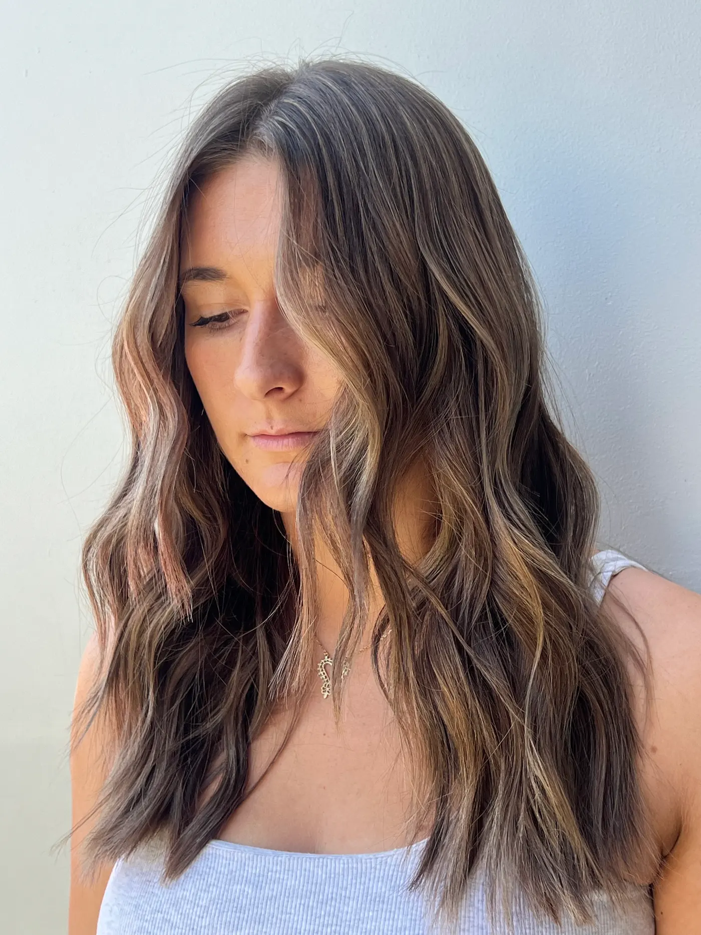 Dimensional brunette lob with soft face-framing pieces