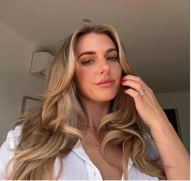 Sun-kissed dark blonde with dimension through the lengths