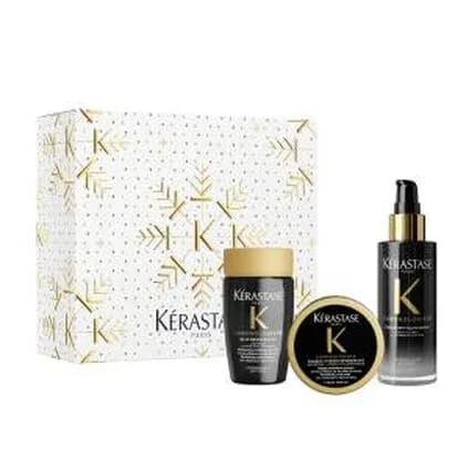 Kérastase Chronologiste gift set: shampoo, masque and overnight serum in black and gold beside a white and gold Christmas box